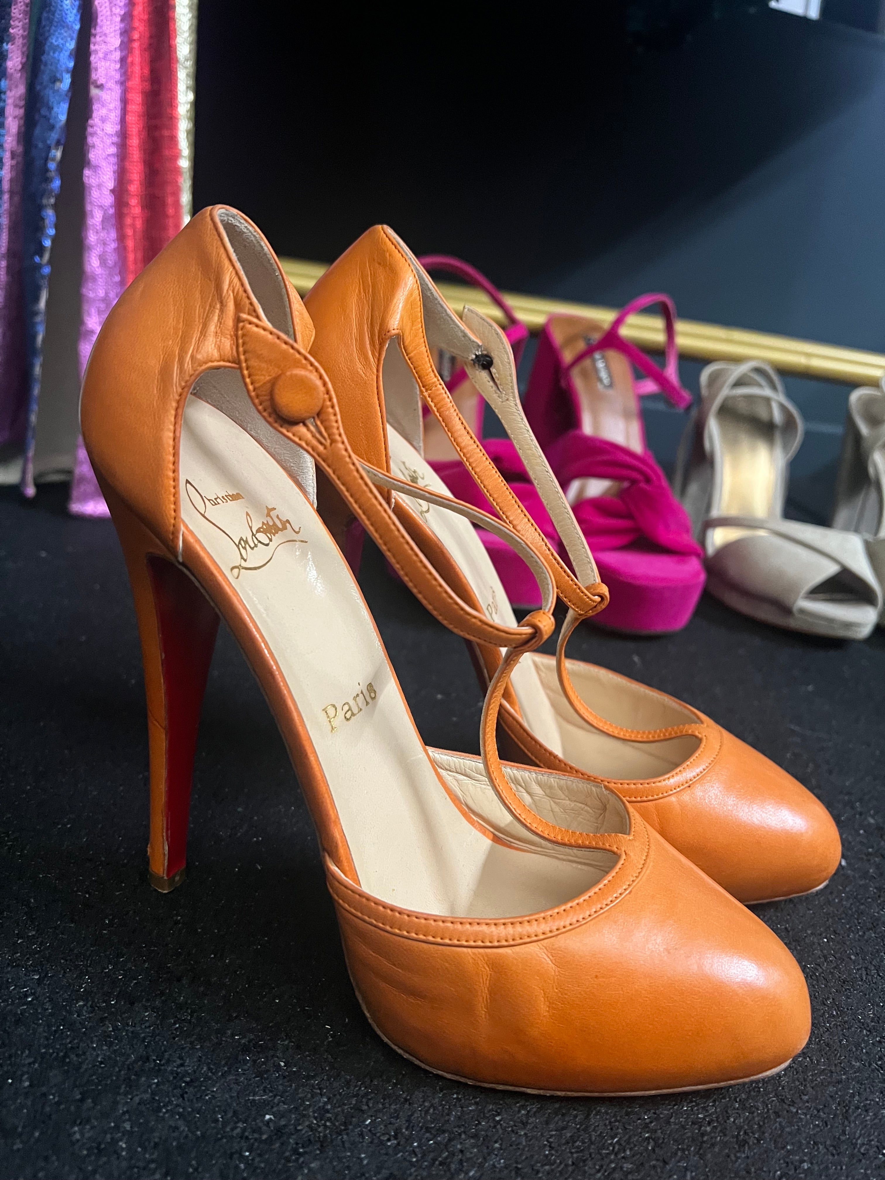 Orange store louboutin heels